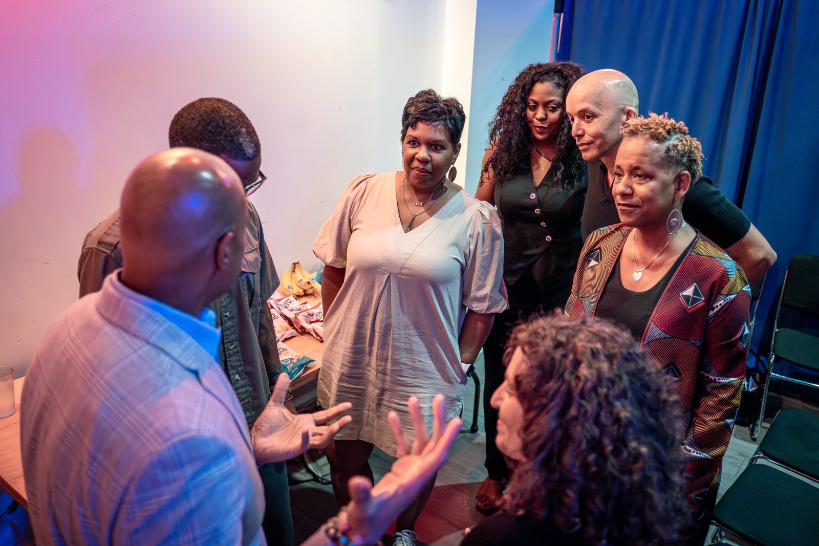 Scott talking with audience members after a show